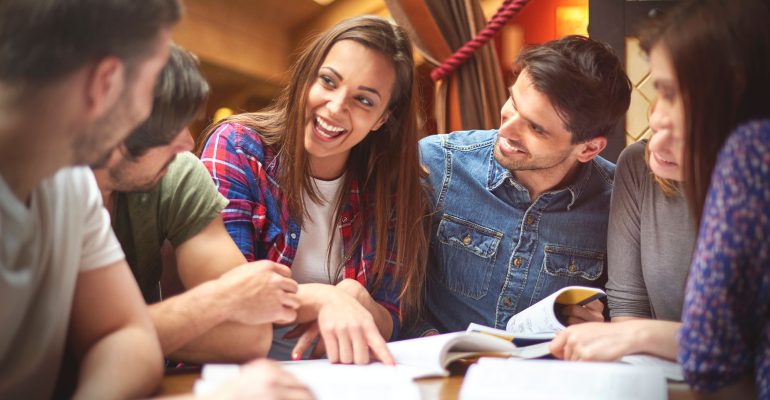 Student sharing her knowledge with her colleagues